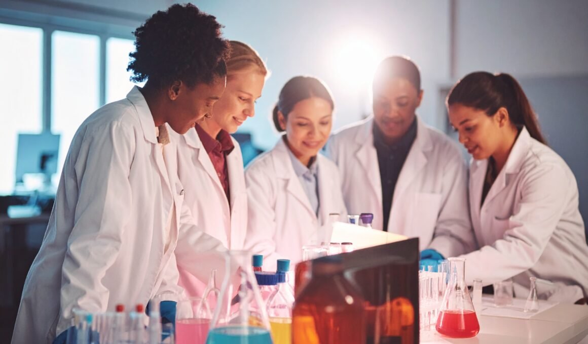 Image of multiracial women in a laboratory in lab coats experimenting with formulas denoting experimenting with cooking and food content for the article 'How to Start a Profitable Recipe Blog in 2026 (The Stack I’d Actually Use)'