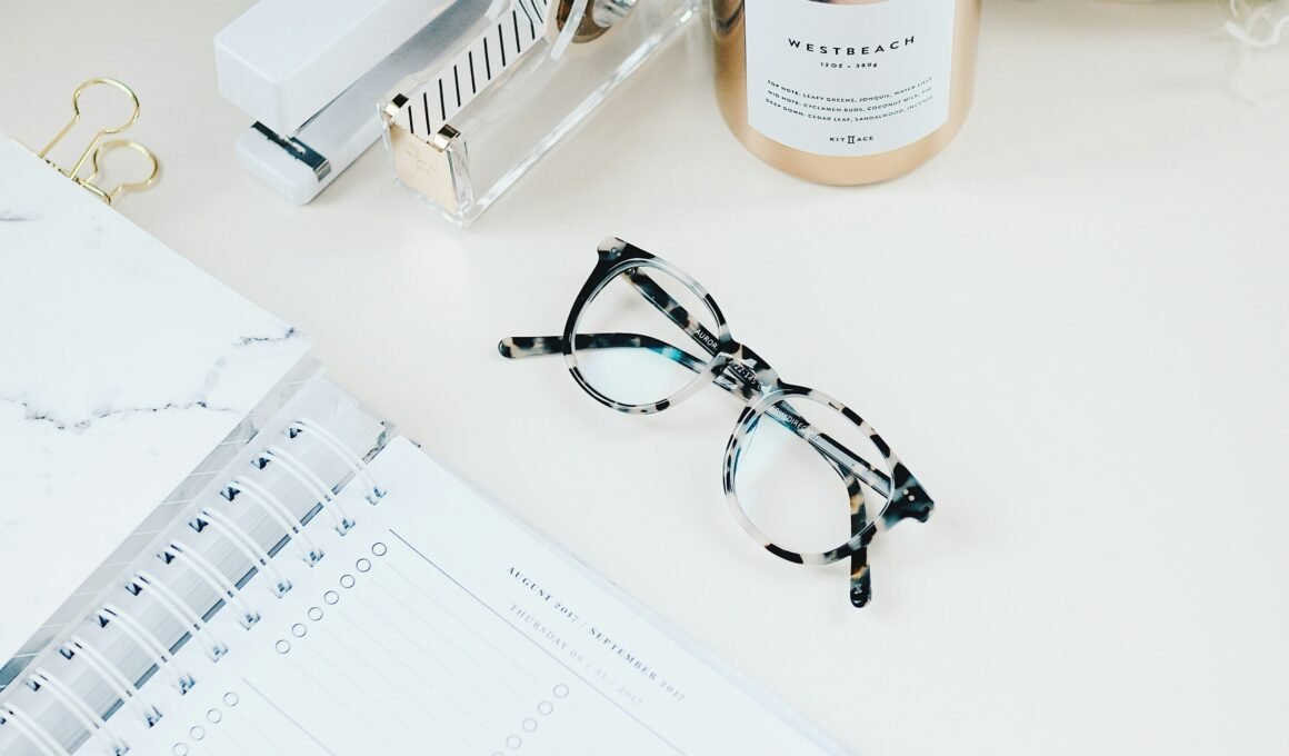 White table top, with glasses, journal - aesthetic look