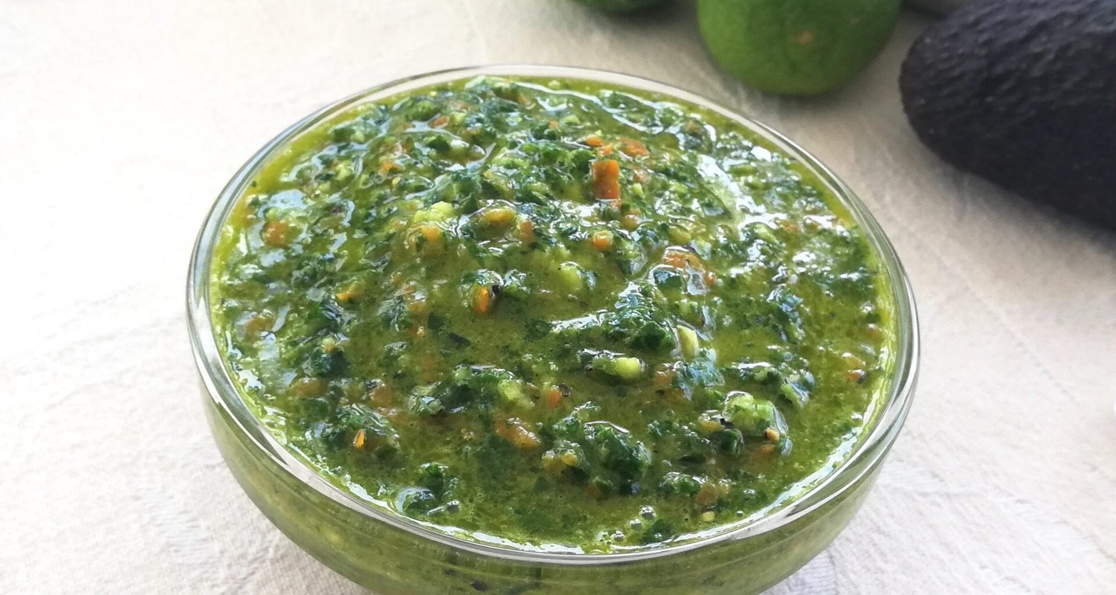 Small condiment bowl filled with green Kale pepper pesto recipe