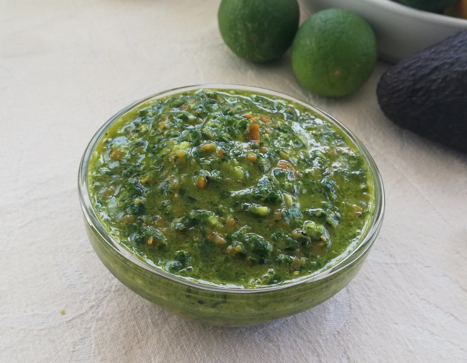 Small condiment bowl filled with green Kale pepper pesto recipe
