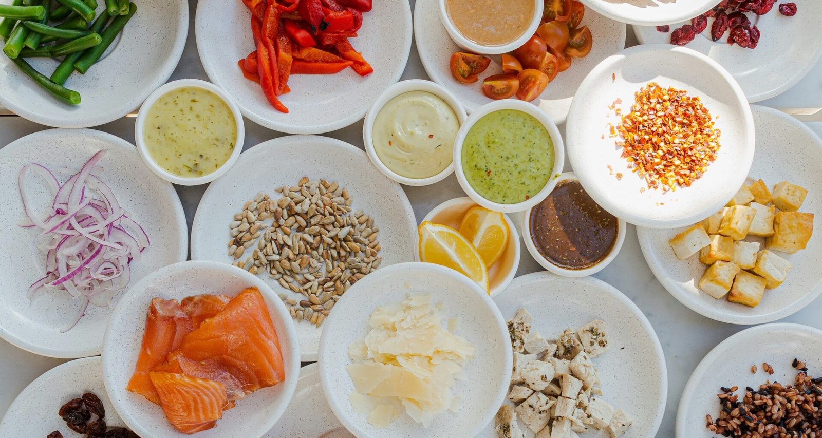 Building a salad - plates with separate ingredients.
